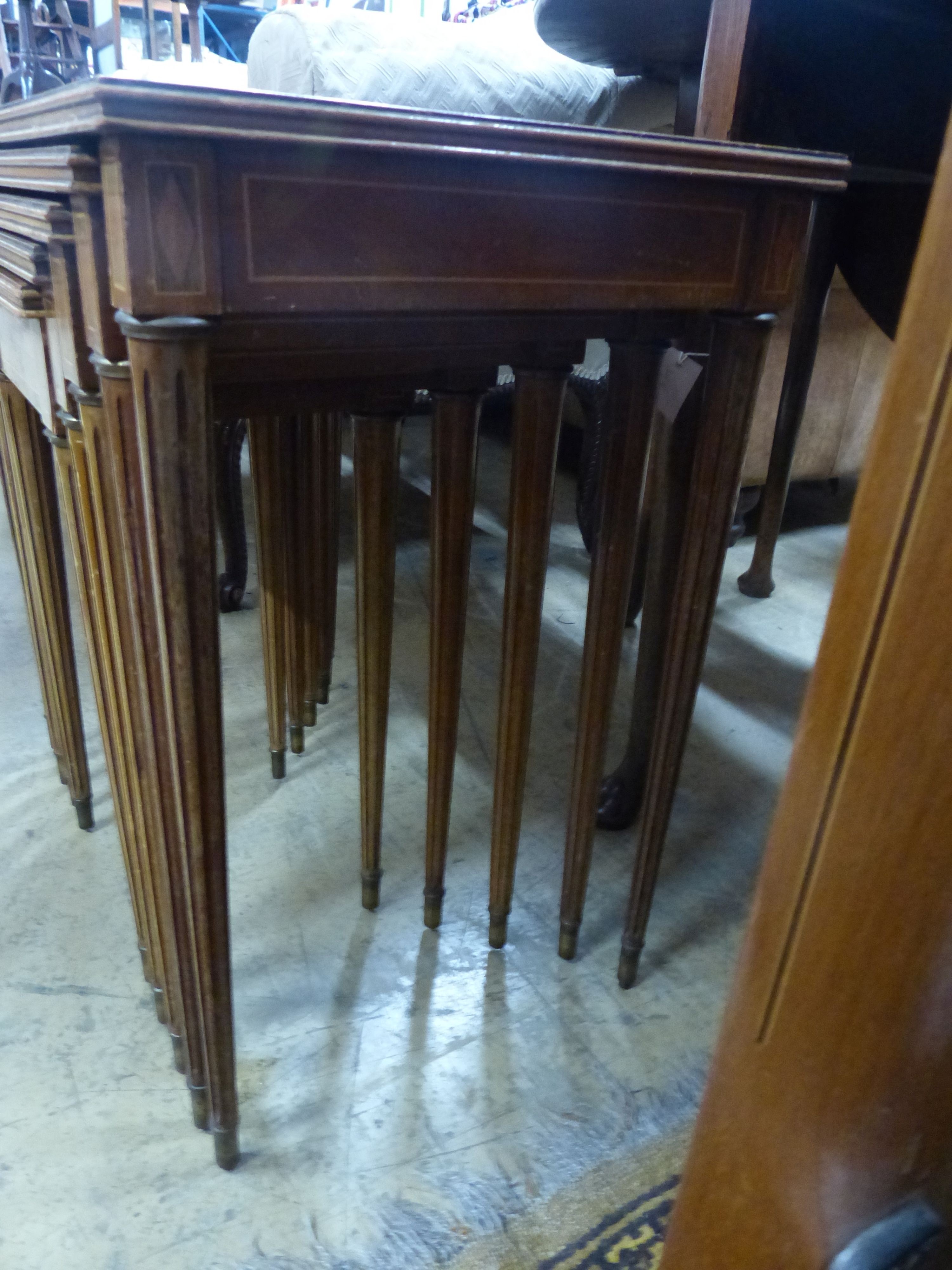 A quartetto of banded and inlaid mahogany tea tables, W.59cm D.37cm H.57cm